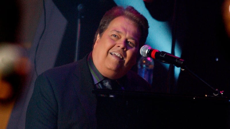 FILE -- Alan Osmond performs during a taping of the Osmonds 50th anniversary show at the...