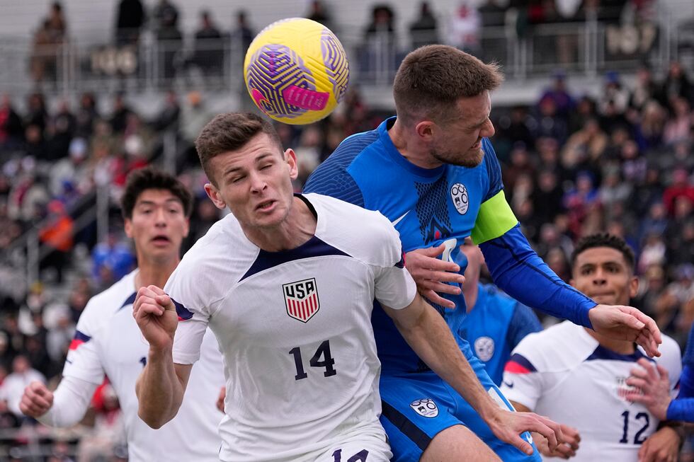 United States midfielder Sean Zawadzki (14) and Slovenia midfielder Timi Max Elsnik vie for a...