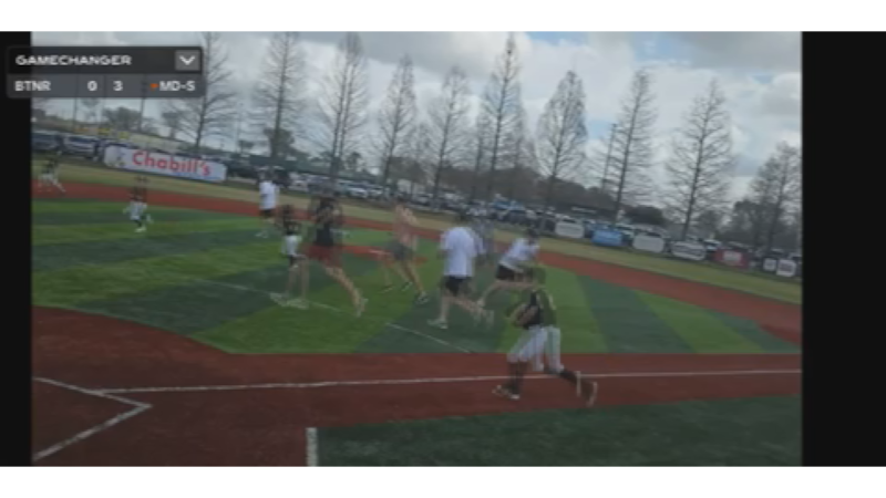 Video from a ballpark in the Gardere area shows the scary moments when shots were fired nearby.