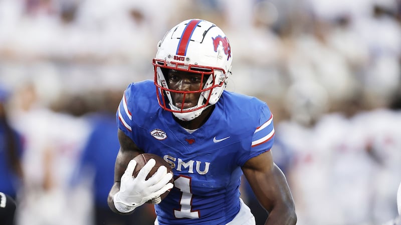 SMU gets 4 TDs from Smith and three more with offense watching, beats TCU  66-42 after Dykes ejected