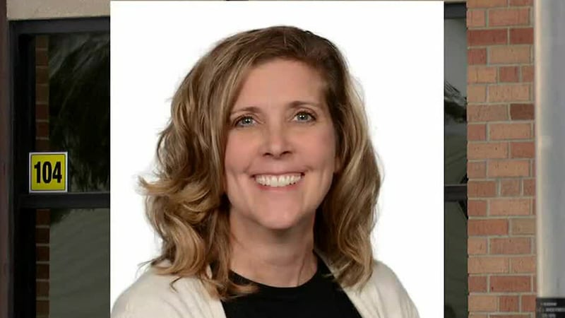 Superintendent Kelly Casper directed the children into a small bathroom off the nurse’s...