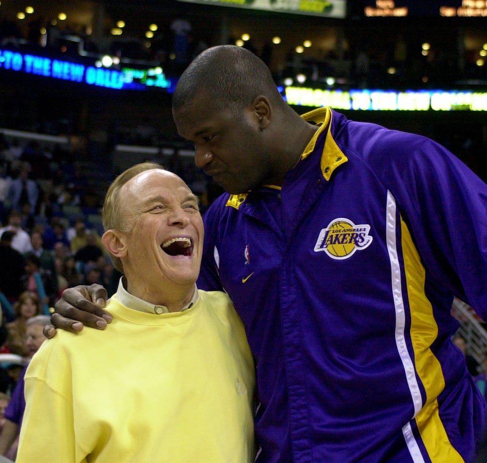 Los Angeles Lakers center Shaquille O'Neal, right, greets former LSU basketball coach Dale...