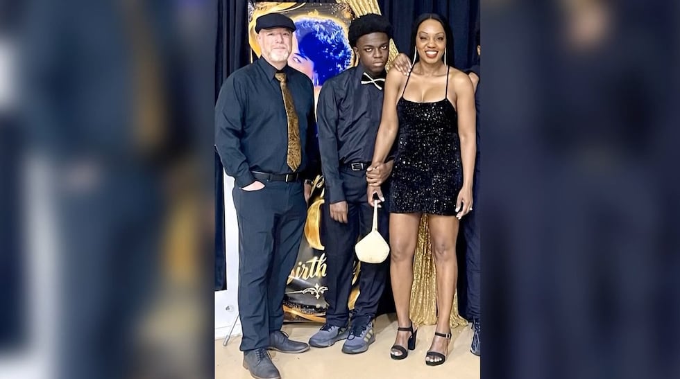Jeremiah (left) and Felicia Sams are pictured with their son, Will, who is on the autism...