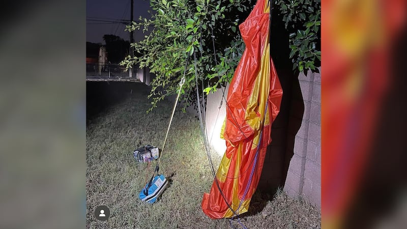 California officials investigated after a parachute with two packages attached to it was found...