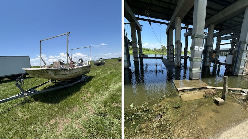 Boats are being pulled from the water and moved onto the levee in Pointe à la Hache as...