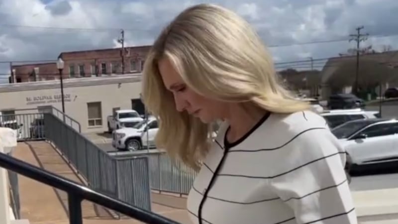 Former DeRidder mayor Misty Roberts arrives at the Beauregard Parish Courthouse for her...